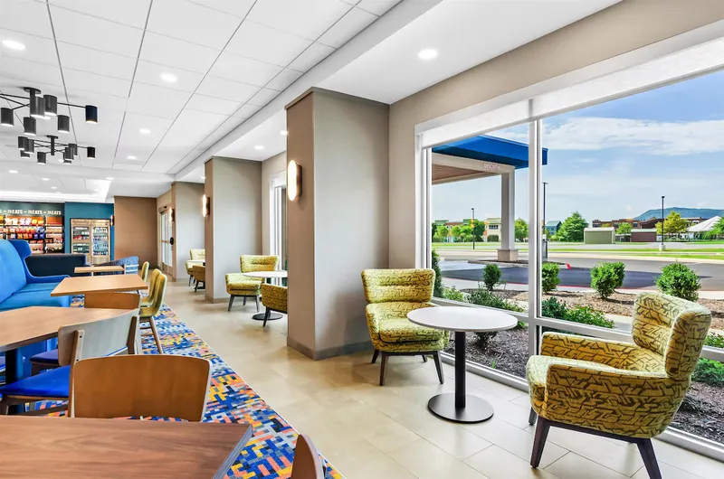 Lobby seating along the window wall. Hampton Inn, Daleville, VA