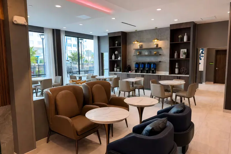 Lobby lounge seating. La Quinta by Wyndham, Hollins, VA