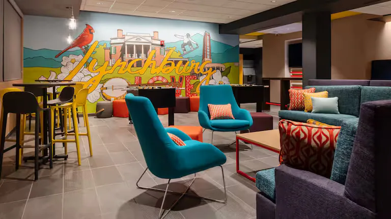 Lynchburg mural and lounge seating. Tru by Hilton, Lynchburg, VA