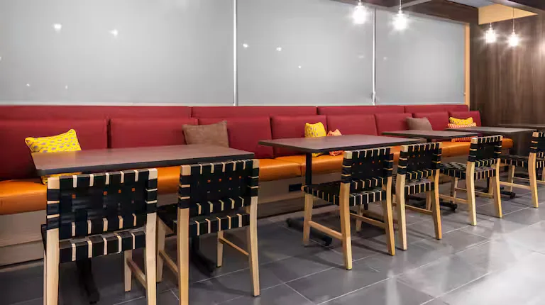 Communal banquette seating. Tru by Hilton, Lynchburg, VA